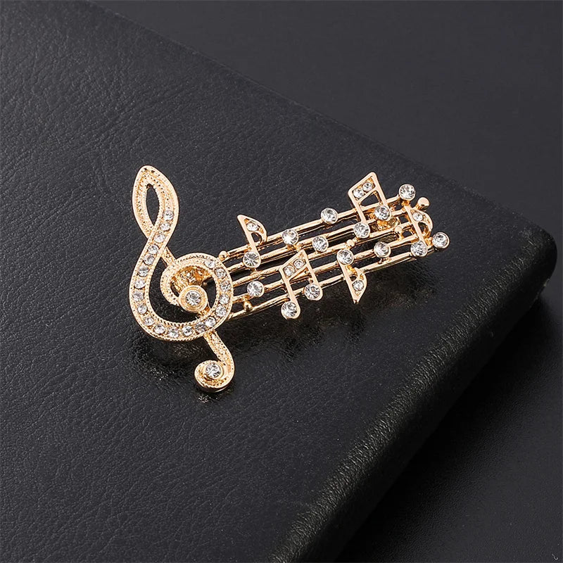 Elegant Unisex Music Note Crystal Brooch Design